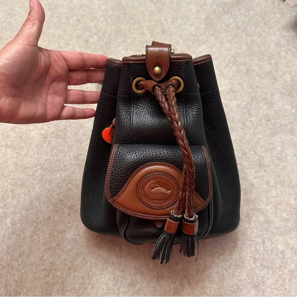 Vintage Dooney & Bourke Black w/Brown All Weather Leather Sling Small Backpack